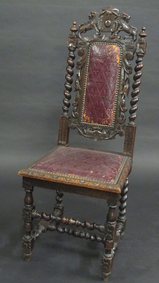 A Victorian carved oak Carolean style high back dining chair, the  seat and back upholstered in leather, with spiral turned  decoration, raised on turned and block supports