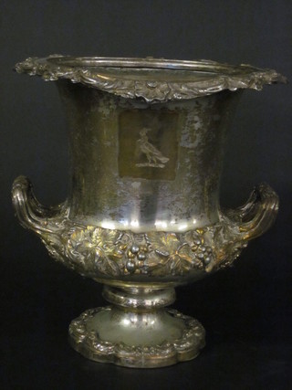 A 19th Century silver plated twin handled wine cooler with cast  and armorial decoration 10"