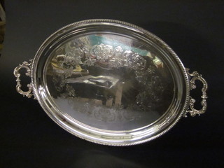 An engraved oval silver plated tea tray 24"