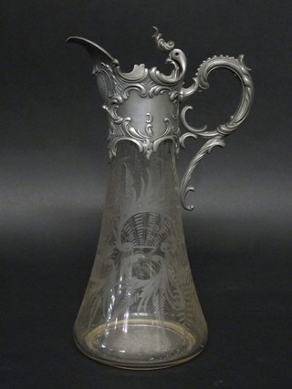 An Art Nouveau Continental etched glass claret jug with pewter mount  ILLUSTRATED