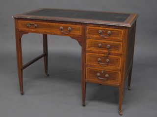 An Edwardian inlaid mahogany typists desk with inset leather writing surface, fitted 1 long and 4 short drawers, raised on  square tapering supports 39"