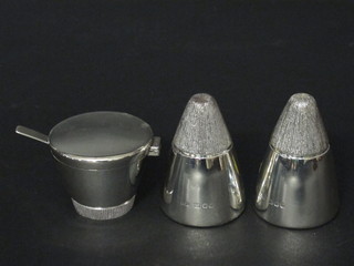 A modern silver waisted cylindrical 3 piece condiment set comprising salt, pepper and mustard pot, 9 ozs
