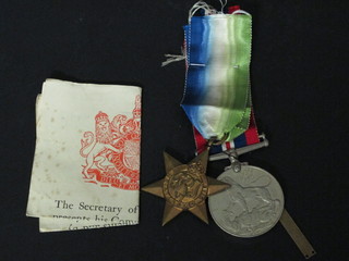A pair Atlantic star and clasp France and Germany and a British  War medal