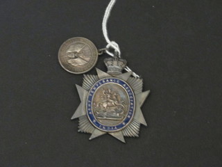 An India Army Temperance Assoc. medal and a silver medal to commemorate the Battle of Jutland
