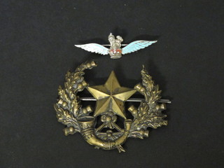 A Highland Light Infantry cap badge and a Glider Pilot Regt. silver and enamelled sweetheart brooch