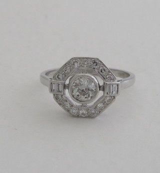 A lady's 18ct white gold dress ring set a diamond surrounded by  diamonds, approx 0.85ct