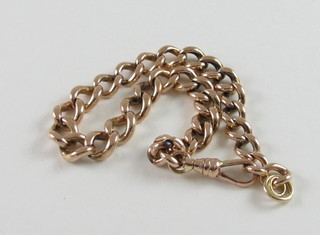 A gold curb link bracelet