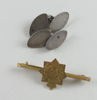 A 9ct gold Army Service Corps sweetheart brooch together with  a pair of oval silver cufflinks