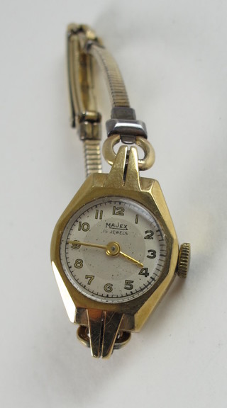 A lady's Majex wristwatch contained in a gold case