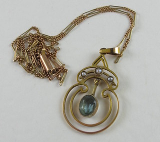A gilt metal pendant set pearls and citrene hung on a fine gold  chain