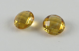 2 round cut yellow citrines approx 7.37ct