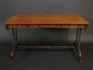 A William IV rectangular rosewood library table, raised on a  spiral turned column with H framed stretcher 50"   ILLUSTRATED