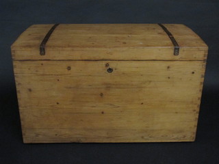 A Continental iron bound stripped and polished pine coffer with  hinged lid and iron drop handles 40"