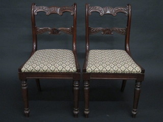 A set of 4 William IV carved mahogany bar back dining chairs  with shaped seats, raised on turned supports