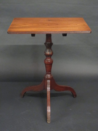 A handsome Victorian rectangular mahogany snap top wine table, raised on a pillar and tripod base 24"  ILLUSTRATED