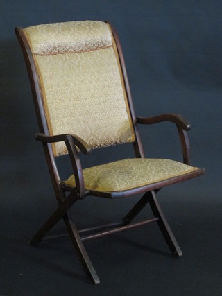 A mahogany framed folding campaign chair