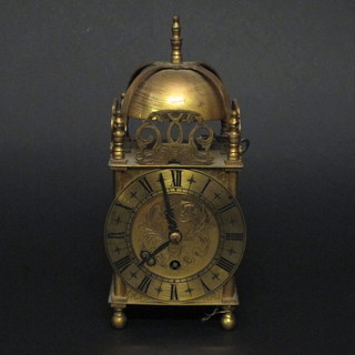 A reproduction 17th Century style lantern clock with pink dial by Smiths