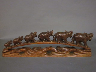 A carved African hardwood bridge of hippopotamus 29"