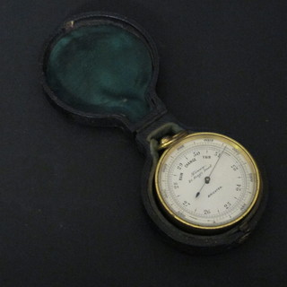 A pocket barometer by Direy of 21 Kings Road Brighton,  contained in a leather case