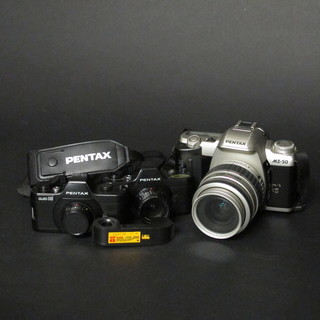 A Pentax MZ-50 camera together with 2 Pentax Ashi Auto 1100  cameras