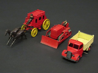 A Dinky model Bedford tip up tipper truck, model Bulldozer and model stage coach