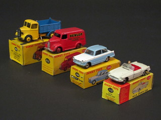 4 Dinky Toys models - Bedford end tipper no.410, Trojan  15CWT van no. 451, a Triumph Herald no. 189 and an MGB  sports car no. 113, all boxed