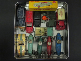 An empty cardboard box for a Dinky Packard convertible no.  132 together with a collection of various Dinky Racing cars, toy  cars etc