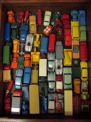 A collection of various toy cars, mostly Lesney