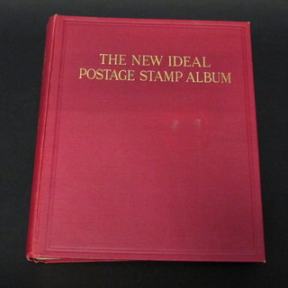 A red New Ideal stamp album