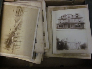 A Victorian album of black and white photographs together with  other early photographs