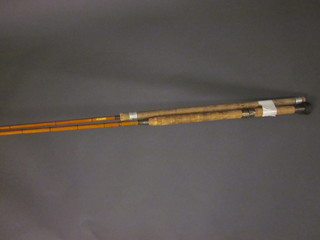 An Elasticane 3 section fishing rod and 1 other