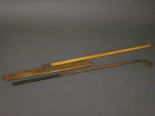 A Propelles Brand hickory shafted no.2 golf club together with a  wooden and metal golf sand scraper for Samo Greens, used in  Africa and the Middle East