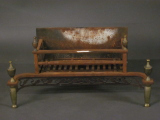 A 19th Century steel and brass fire basket 29"