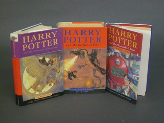 J K Rowling, 3 volumes "Harry Potter and The Goblet of Fire",  "Harry Potter and The Philosopher's Stone" and "Harry Potter  and The Prisoner of Azkaban"