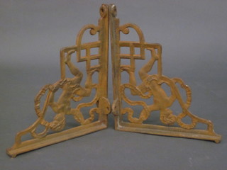 A pair of Victorian 8" pierced cast iron wall brackets marked  RD281