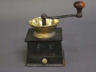 A 19th Century square brass and iron coffee grinder