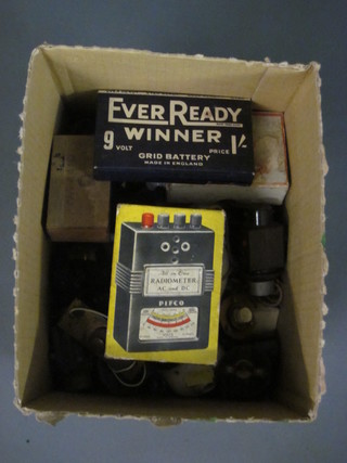 A box containing a collection of vintage ceramic, Bakelite and brass light fittings etc