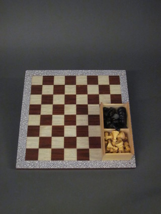 A Staunton wooden chess set together with board