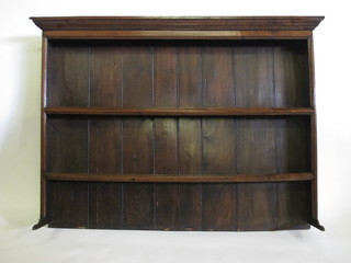 A 17th/18th Century oak dresser back fitted 2 shelves with  moulded cornice, 63"
