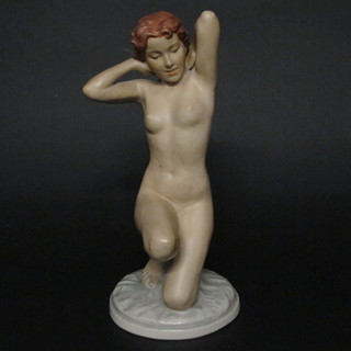 A Royal Dux figure of a kneeling naked lady, the base marked  Royal Dux and impressed 210 P11 12"   ILLUSTRATED