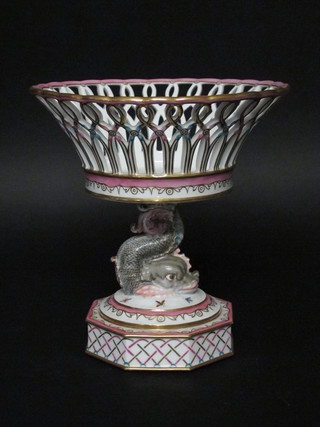 A 19th Century porcelain ribbonware dish supported by a dolphin 10"