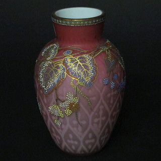 A pink opaque glass vase with enamelled butterfly and leaf  decoration 6"