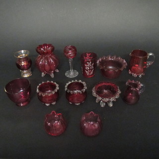 A collection of various cranberry glass squat shaped vases, jugs  etc