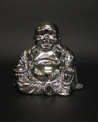 A silver glazed pottery figure of a seated Buddha 9"