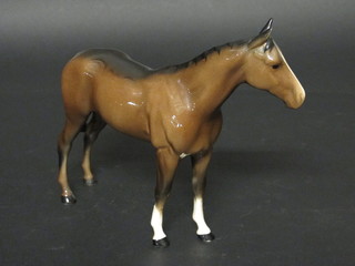 A Beswick figure of a standing bay horse 8", 1 leg f,