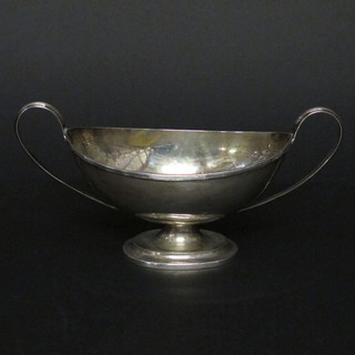A Victorian silver boat shaped twin handled Georgian style urn, Sheffield 1898, 6 1/2 ozs