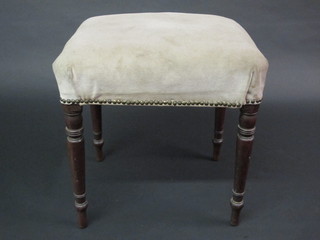 A 19th Century rectangular mahogany stool with upholstered seat, raised on turned supports 17"