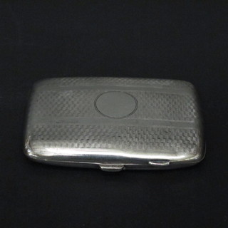 A silver cigarette case with engine turned decoration Birmingham 1921, 2 ozs