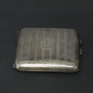 A silver cigarette case Birmingham 1918, 3 ozs