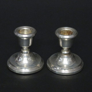 A pair of modern silver stub shaped candlesticks, Birmingham,  3"